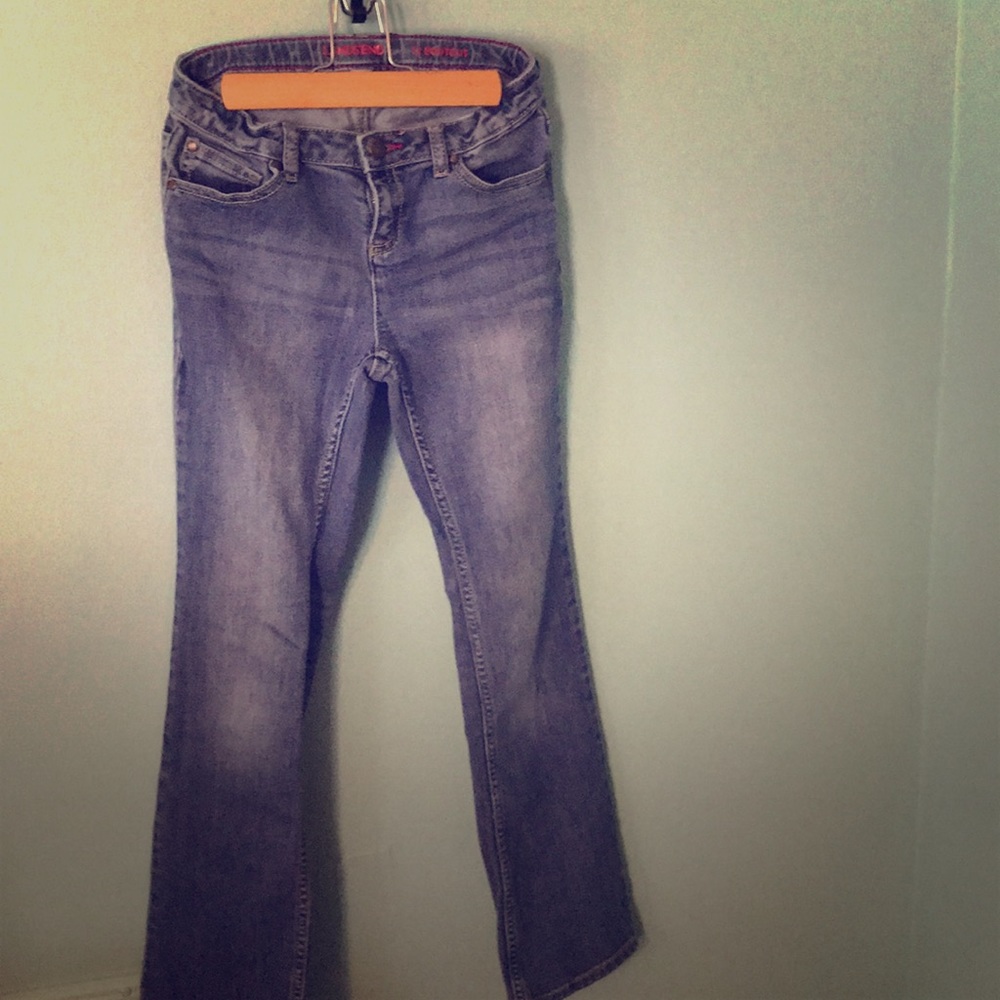 Lightly worn Justice boot-cut blue jeans. Girls 12